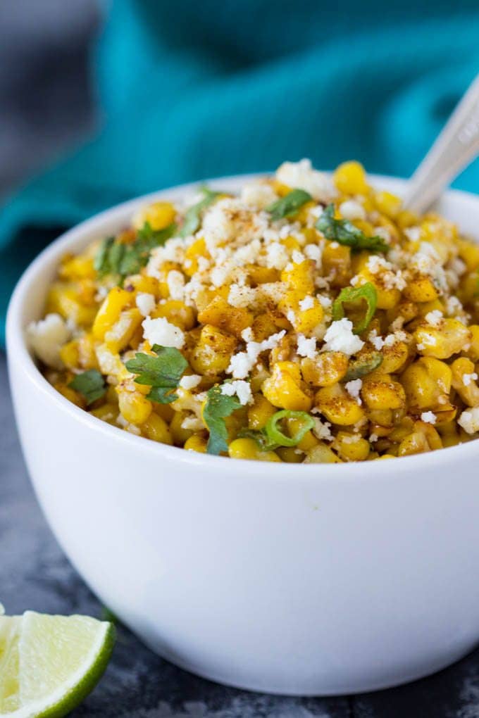 Mexican Street Corn being served in a white bowl