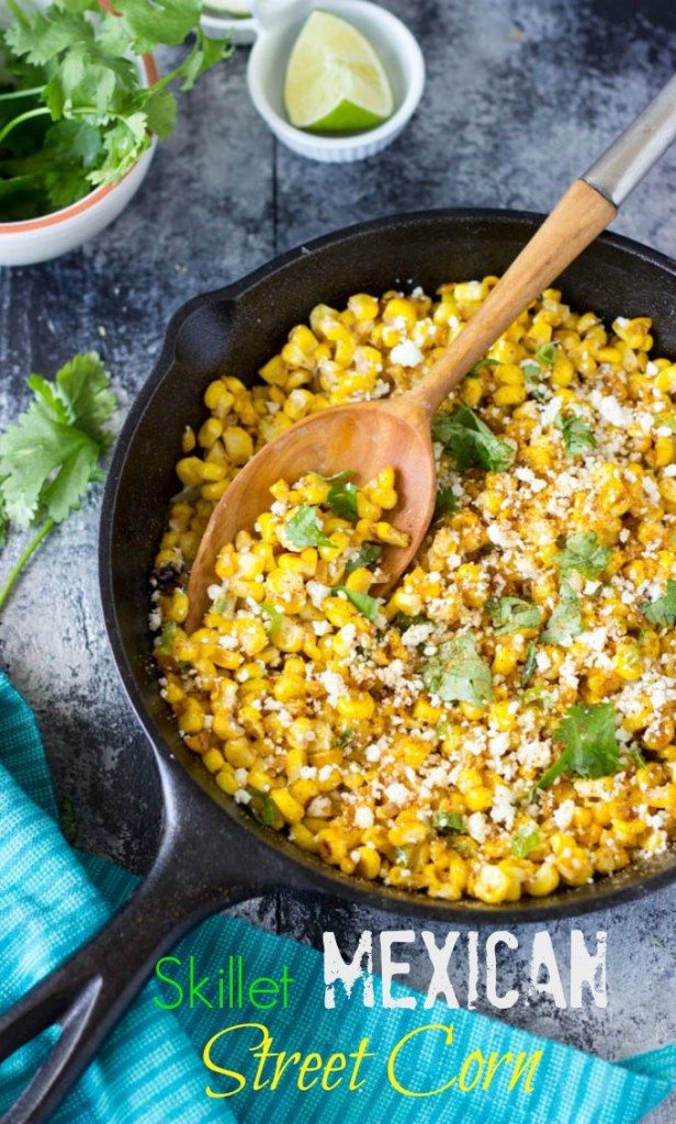  Mexican Street Corn in a black skillet with serving spoon