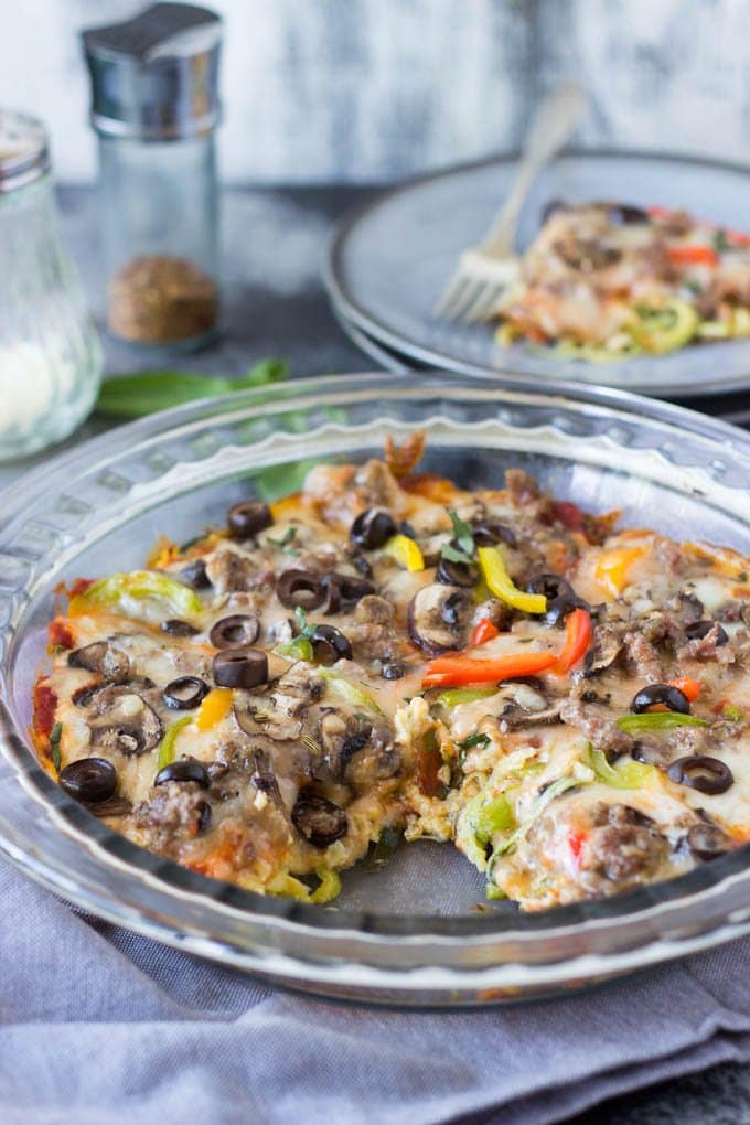 Piping hot pizza slices loaded with sausage, cheese, bell peppers, mushrooms and olives. All the things you love about pizza but with one big difference, this version is low-carb