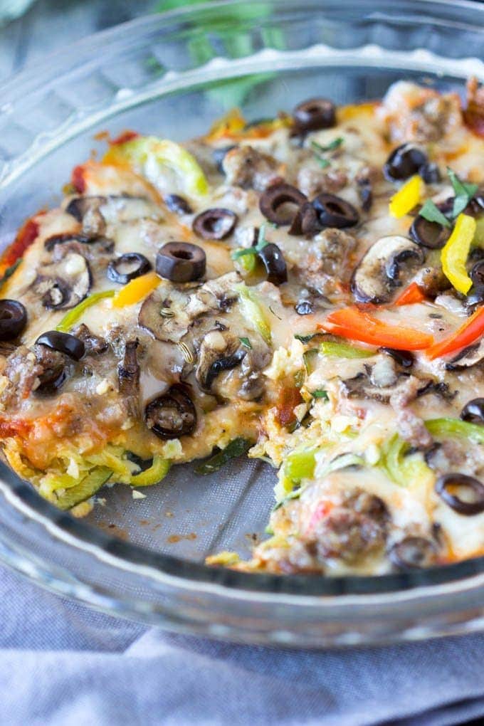 Piping hot pizza slices loaded with sausage, cheese, bell peppers, mushrooms and olives. All the things you love about pizza but with one big difference, this version is low-carb