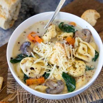 Creamy Cheese Tortellini + Mushroom Soup -The EASIEST one-pot creamy soup EVER! Loaded with Three Cheese Tortellini , Mushrooms and Spinach