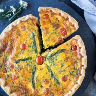 Asparagus and Cheddar Quiche in a serving dish
